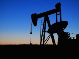 An old pump jack. Decline curves means minerals are worth less over time.