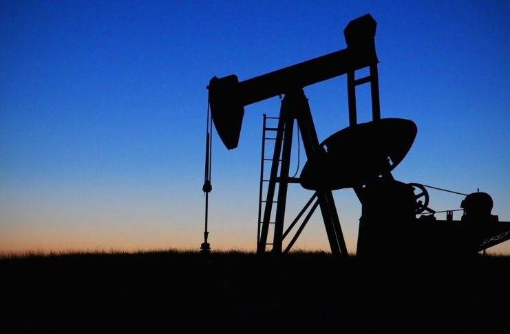 An old pump jack. Decline curves means minerals are worth less over time.